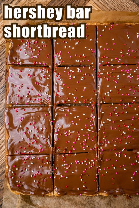 Amazingly delicious! Why you’ll love this recipe: Easy recipe with only 10 minutes prep time. 7 ingredients. Easy chocolate bar frosting. Just wait ’til you spread those melted Hershey bars. It’s so satisfying. Just watch! Healthy Stretches, Easy Chocolate Bars, Brown Sugar Shortbread, Finger Desserts, Chocolate Bar Recipe, Toffee Cake, Hershey Candy Bars, Christmas Shortbread, Bake Sale Recipes