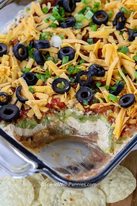 7 layer dip recipe is the perfect appetizer. Layers of beans, sour cream, guacamole and salsa are the best combo! #spendwithpennies #7layerdip #layerdip #sevelayerdip #7layerbeandip #beandip Layered Bean Dip Recipe, Layer Dip Recipe, 7 Layer Bean Dip, 7 Layer Taco Dip, 7 Layer Dip Recipe, Layered Dip, Cold Dip Recipes, Layered Dip Recipes, Layered Bean Dip