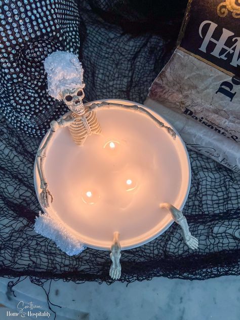 This DIY Halloween candle is a super inexpensive way to bring humor to your Halloween decorations with a bowl and candles from Dollar Tree and a two dollar WalMart skeleton! Skeleton Bathtub, Candles Bathtub, Halloween Candles Diy, Dollar Store Candles, Halloween Themed Food, Scary Halloween Decorations Diy, Spooky Decorations, Dollar Tree Halloween, Dollar Store Halloween