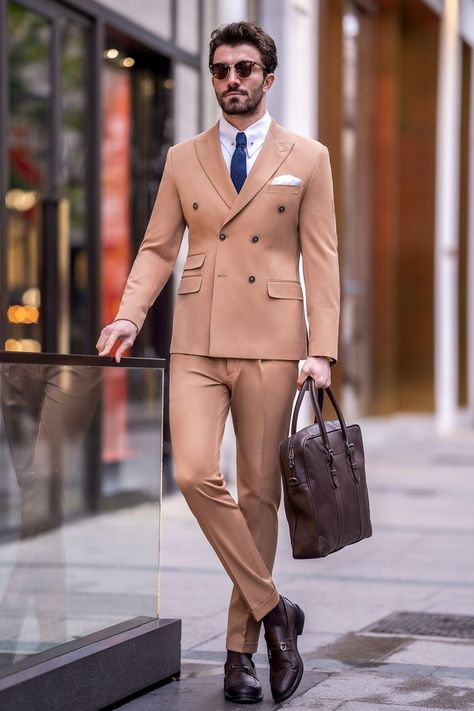 Investing in a Camel Double-Breasted Suit is investing in timeless style. Whether you're a seasoned professional or a fashion-forward trendsetter, this versatile ensemble will elevate your look, leaving a lasting impression wherever you go.

#doublebreasted #camelsuit #suit #suits #slimfit #menstyle #menfashion #fashioninspo Bow Tie Suit, Modern Fit Suit, Suit Stores, Suit Styles, Slim Fit Suit Men, Tuxedo Blazer, Slim Fit Suits, Blazer Vest, Men's Suit