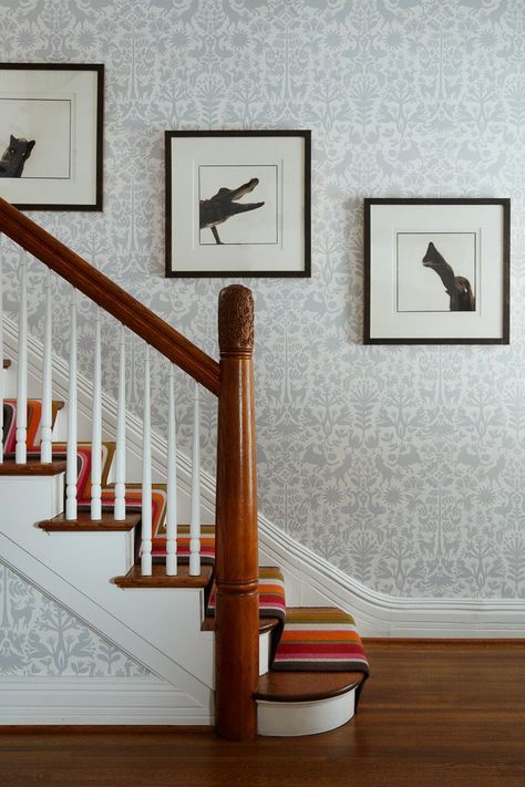 This wallpaper showcases an understated pattern of natural imagery. Staircase Wallpaper Ideas, Stairway Wallpaper, Hallway Wallpaper Ideas, Wallpaper Foyer, Staircase Wallpaper, Wallpaper Staircase, Foyer Wallpaper, Wallpaper Hallway, Wallpaper Stairs