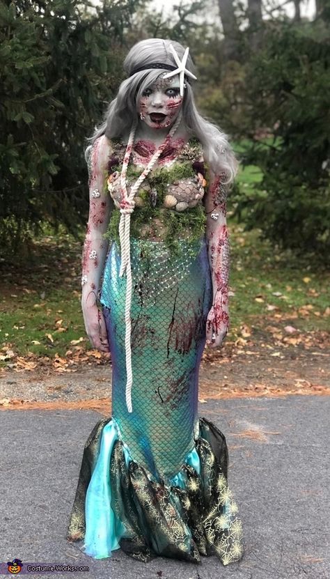 Victoria: My daughter jazlynn is wearing the costume. I thought of the idea from the little mermaid but used my imagination and decided to add gore. I ordered a yard of... Zombie Mermaid Costume, Mermaid Zombie, Zombie Mermaid, Scary Mermaid, Iridescent Scales, Mermaid Makeup Halloween, Evil Mermaids, Evil Queen Costume, Siren Costume