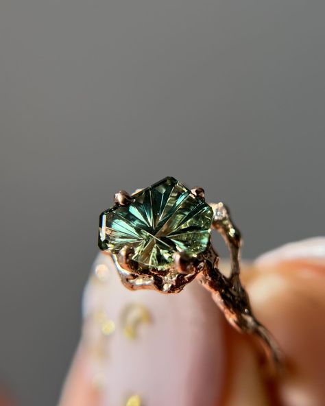 Several inquiries about this one… she’s spoken for, but I recently restocked my John Dyer Starbrite Freeform cuts! 💍details: Naples Half Halo in 14k rose gold with tiny diamond accents and a center 1ct parti color Australian Freeform Starbrite cut by @johndyergems • • • #oliviaewing #oliviaewingjewelry #naturelovers #nature #naturejewelry #branchjewelry #forestjewelry #natureasthetic #cottagecore #cottagestyle #fairytale #fairyaesthetic #fairycore #acotar #feyre #fairylife #acotarjewel... Natural Gem Engagement Rings, Fairy Inspired Engagement Rings, Starbrite Cut Engagement Ring, Starbrite Cut Ring, Fairycore Engagement Ring, Natural Wedding Rings, Natural Stone Engagement Ring, Whimsical Rings, Nature Engagement Rings