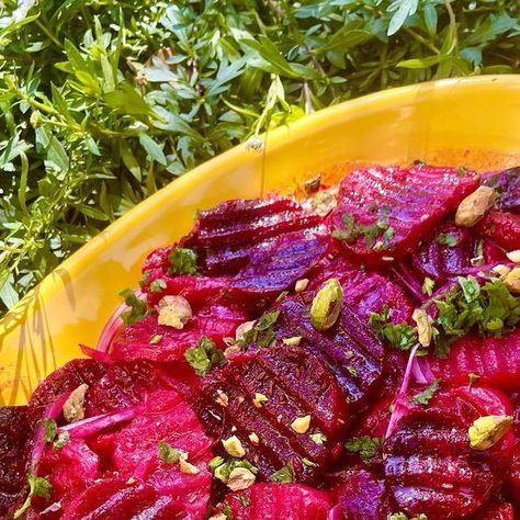 Stella Hanan Cohen on Instagram: "BEETS SALAD
“Salata de Panjar” 

Ruby, red or golden baby beets, boiled and pickled in vinegar brine with sliced onion is served frequently at meals. 
As a twist on tradition to the Rodesli picked or “salamura”, I like roasting them to release their earthy flavors and drizzle a delicious pomegranate molasses dressing, aromatic with spices, including the Rhodian favorite spice, cumin, topped with crunchy pistachios and fresh herbs. 
This vibrant beet salad, “salata de panjar” brimming with flavors and textures makes a great addition to the meze platter at my Shabbat table. I hope you enjoy this version and wish you a good week. 

•	2-3 bunches, red or golden baby beets/beetroots, about 2 to 3 pounds (1 to 1 1/2 kilos) 
•	One large, red onion thinly Pomegranate Molasses Dressing, Beets Salad, Meze Platter, Shabbat Table, Sliced Onion, Pomegranate Molasses, Beet Salad, Good Week, Red Onion