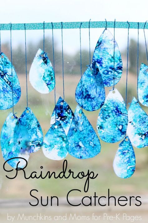 raindrop suncatchers fine motor for preschool Raindrop Crafts For Kids, Rain Drop Suncatcher, Raindrop Suncatchers, Weather Preschool, Motor Art, Weather Crafts, April Crafts, Weather Theme, Easter Preschool