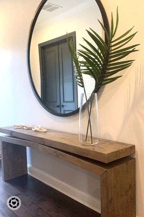 Organic modern entry Wood console Reclaimed wood Oversized plant stems White marble chain link decor Oversized round mirror 60” round mirror Large console table #competition #organicmodern Follow my shop @hausofsavos on the @shop.LTK app to shop this post and get my exclusive app-only content! #liketkit #LTKhome #LTKstyletip #LTKsalealert @shop.ltk https://liketk.it/3O3cc Console Table Black Wall, Console Table Decorating Large Wall, Console Table Round Mirror, Organic Modern Console Table Decor, Round Mirror Console Table, Black Round Mirror Entryway, Organic Modern Console Table, Large Round Mirror Entryway, Organic Modern Entry