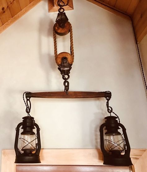 Twin Dietz lantern with single tree and two Myers barn pulleys. Pulley Ideas, Lantern Lighting, Lantern Pendant Lighting, Rustic Pendant Lighting, Single Tree, Tiny Cabins, Tiny Cabin, Lantern Pendant, Farmhouse Style Decorating