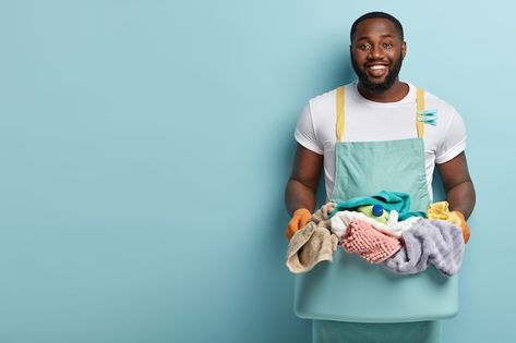 Free photo young african american man do... | Free Photo #Freepik #freephoto #male #person #people-man #adult Man Doing Laundry, Laundry Service Business, Wedding Couple Cartoon, American Logo, Redhead Men, African American Man, Thick Beard, House Chores, Graphic Design Flyer