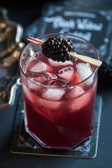 16 Easy Halloween Punches We’re Completely Obsessed With #refinery29 https://www.refinery29.com/en-us/2015/10/95204/halloween-punch-bowl-party-ideas#slide-12 Black Widow Cocktail, Halloween Punch Bowl, Easy Halloween Cocktails, Cocktail Recipes For A Crowd, Halloween Punch Recipes, Vodka Punch, Halloween Bridal Showers, Alcoholic Punch Recipes, Halloween Drinks Alcohol