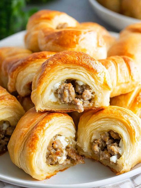 Sausage and Cream Cheese Crescents Sausage And Cream Cheese Crescent Rolls, Sausage Cream Cheese Crescent Rolls, Cheese Crescent Roll Recipes, Sausage Crescent Rolls, Sausage And Cream Cheese, Crescent Rolls Recipe, Puff Pastry Recipes Savory, Sausage Cream Cheese, Sausage Appetizers