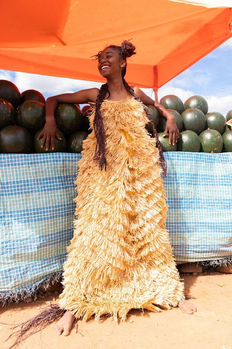 A girl with the the Rafia Maxi dress for Cannes film festival designed by Made for a Woman Madagascar Palm, Social Project, Raffia Palm, Social Projects, The Fashion Industry, Festival Design, Fashion Industry, Cannes Film Festival, Supply Chain