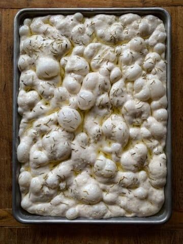 Thick Soft yet Crispy Sourdough Focaccia Recipe - Feeling Foodish Sour Dough Faccocia, Sourdough Faccocia Breads, Sour Dough Focaccia, Snowflake Sourdough, Focaccia Bread Sourdough, Quick Sourdough Foccacia Recipe, Sourdough Ficcotia Bread Recipe, Sourdough Faccia Bread Recipes, Sourdough Foccacia Bread