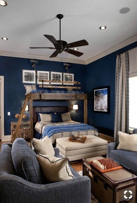 Inviting navy blue boys bedroom with full size bottom bunk bed and seating area. #bedroomdecor #navyblue Teen Boy Bedroom Decor, Teen Room Designs, Teenage Room Decor, Teenager Bedroom Boy, Teenage Boy Room, Boys Room Design, Teen Boy Room, Boy Bedroom Design