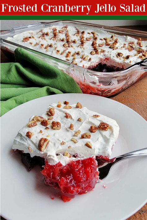 This frosted cranberry Jello salad has a fluffy cream cheese topping and a surprise ingredient inside. The Jello features cranberry sauce, pineapple, and Coke for that extra bit of kick. This old-fashioned recipe is still super delicious and fun. Cucumber Chicken, Cranberry Jello Salad, Cranberry Salad Recipes, Chicken Greek, Cranberry Jello, Frosted Cranberry, Broccoli Potato, Cream Cheese Topping, Beautiful Salad