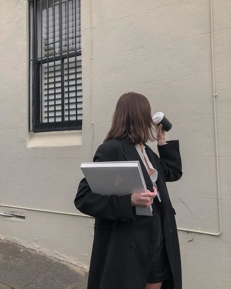 A Woman, Laptop, Building