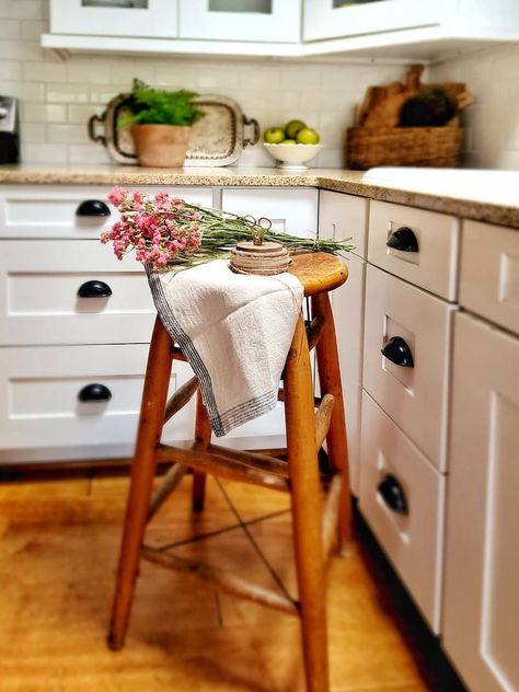 Do you have a vintage stool or two around the house? I’ll show you how to make the most of a vintage stool and the 7 ways to use them around your home. Vintage Stool Decor, Farmhouse Stools, Oak Bar Stools, Oak Stool, Saddle Stools, Wooden Bar Stools, Vintage Stool, Flea Market Style, Wood Bar Stools