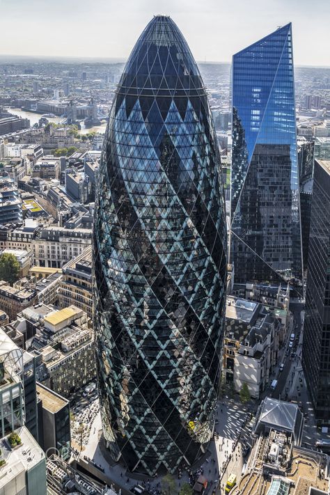 The Gherkin - The Gherkin Two of London’s iconic towers in the City of London. The Gherkin and The Scalpel in the background. Designed by Fosters + Partners and Kohn Pedersen Fox. Gherkin London, The Gherkin, Architecture London, Easy Jet, Famous Architecture, Norman Foster, London Architecture, Skyscraper Architecture, City Background