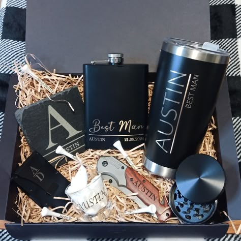 Our Custom engraved groomsman package is the ultimate way to show your appreciation. All items are custom engraved to your specifications, making each piece truly unique. Whether it's a name, a special date, or a meaningful quote, we'll engrave it with precision and care. These packages are complete and ready to go, no need to add anything else. Comes in a black box secured with a ribbon. Inside has crinkle paper shred underneath your product for a simple yet elegant presentation. Wallets are Gr Groomsmen Proposal Cheap Groomsmen Gifts, Gifts For Bridesmaids And Groomsmen, Will You Be My Groomsmen Gifts, Groomsman Proposal Ideas Non Alcoholic, Groomsmen Basket, Grooms Proposal Ideas, Groomsmen Box Ideas, Groomsmen Proposal Non Alcoholic, Bestman Proposal Box Ideas