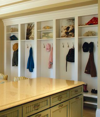 Organizing Small Homes from houseplansandmore.com Between The Studs, Between Studs, Traditional Entry, Narrow Closet, Small House Organization, Green Backsplash, Mudroom Lockers, Cabinets White, House Plans And More