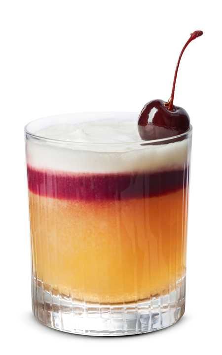 New York Sour Recipe | OHLQ.com New York Sour Recipe, Twenty Fine, Layered Cocktails, New York Sour, Beautiful New York, Sour Foods, Sunset Red, Bar Spoon, Rye Whiskey