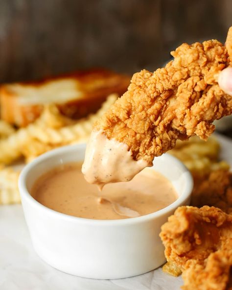 a chicken finger being dipped in an orange, mayo based sauce Costco Chicken Bake, Canes Sauce, Recipe Copycat, Costco Chicken, Homemade Mayo, Streusel Muffins, Honey Baked Ham, Savory Food, Favorite Chicken