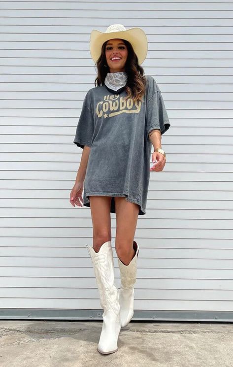 Chic Texas Rodeo Outfits for Women: Winter to Summer Style Guide Tshirt With Cowboy Boots Outfit, Country Tshirt Ideas Concert, T Shirt Dress Outfit With Boots, Big Tshirt Cowboy Boots, T Shirt Cowboy Boots Outfit, Country T Shirt Dress Outfit, Tee Shirt Dress With Cowboy Boots, Cowboy Boots Oversized Shirt, T Shirt Dress And Cowboy Boots