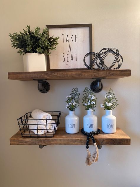 Floating shelves, vase, plant, beads, sign, Oasis Home Decor, Bathroom Shelf Decor Ideas, Shelving Ideas Bathroom, Bathroom Shelves Ideas, Bathroom Shelving Ideas, Farmhouse Rustic Bathroom, Remodel Laundry Room, Home Ideas Bathroom, Small Bathroom Decoration