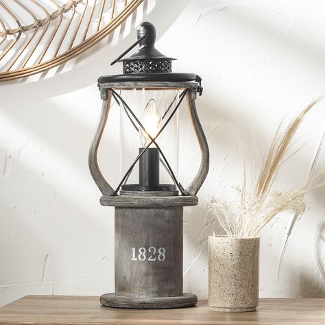 The Peregrine Table Lamp is a perfect addition if you are looking for something to add a nautical essence to your home. Place this Oil Lantern Table Lamp on a side table in a living room, or a console table in your dining room as a nod to your coastal retreat. Shop using the link below: www.ruma.co.uk/products/peregrine-antique-grey-wood-oil-lantern-table-lamp Maritime Style, Lantern Table Lamp, Oil Lantern, Wood Lantern, Wooden Table Lamps, Wooden Lanterns, Lighting Gifts, Grey Table Lamps, Coastal Retreat