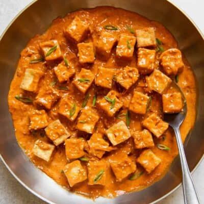 This spicy tofu recipe consists of pan-fried tofu tossed in a rich and flavorful sauce of coconut milk, sambal oelek, and red curry paste. Spicy Tofu Recipes, Vegetarian Chinese Recipes, Creamy Coconut Sauce, Tofu Sauce, Rice Paper Recipes, Cook Tofu, Vegan Bbq Recipes, Recipes Tofu, Homemade Tofu