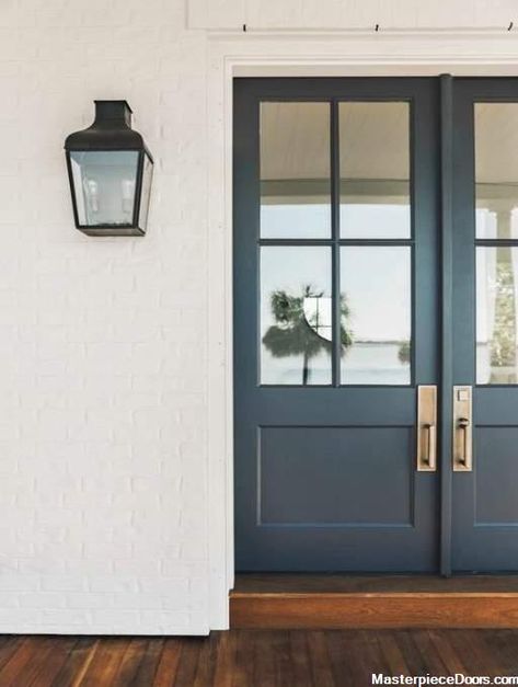 Classic French Front Door featuring a Navy Blue Double Rectangular Composite Wood Door with Privacy Glass and Emtek Locksets Pintu Interior, Wrought Iron Front Door, Iron Front Door, Front Door Paint Colors, Farmhouse Front Door, Door Paint Colors, Painted Front Doors, Casa Vintage, Front Door Colors