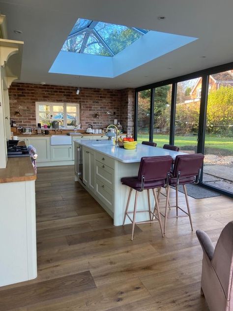 A lantern roof light in a kitchen adds a touch of elegance, providing abundant natural light that creates an open and airy A lantern roof light in a kitchen adds a touch of elegance, providing abundant natural light that creates an open and airy feel. It enhances energy efficiency by reducing the need for arti. It enhances energy efficiency by reducing the need for artificial lighting during the day and can contribute to a modern and stylish design, making the kitchen a focal point of your home. Glass Kitchen Extension Open Plan, Kitchen With Roof Lantern, Extension Lantern Roof, Kitchen With Skylight Roof, Single Storey Rear Extension Flat Roof Lantern, Skylight Kitchen Flat Roof, Kitchen Extension Skylight, Extension With Roof Lantern, Kitchen Roof Lantern