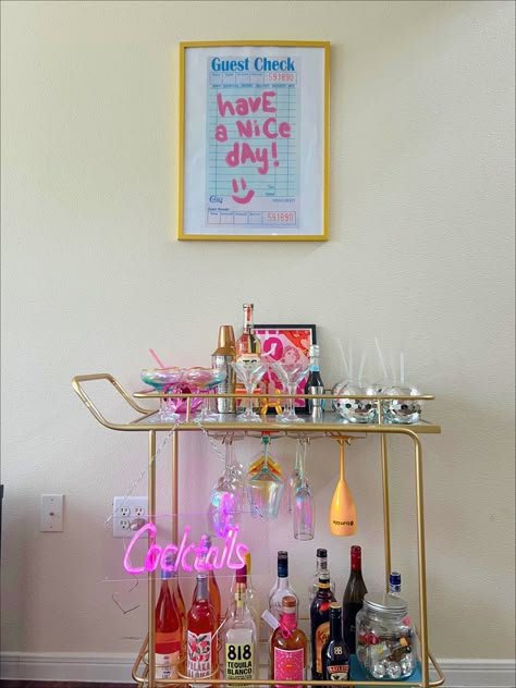 Retro Bar Cart Decor, Collage House Ideas, Bright Bar Cart, Bar Cart With Neon Sign, Funky Bar Cart Ideas, Bar Car Decor, Bar Cart For Apartment, Pink And Gold Bar Cart, Apartment Decorating Bar Carts