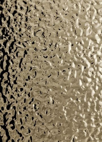 In this image, the gold foil has raised bumps and ridges that show texture. Inox Texture, Water Ripple Sheet, Mirror Texture, Stainless Steel Texture, Texture Metal, Ceiling Texture, Stainless Steel Sheet, Verre Design, Steel Panels