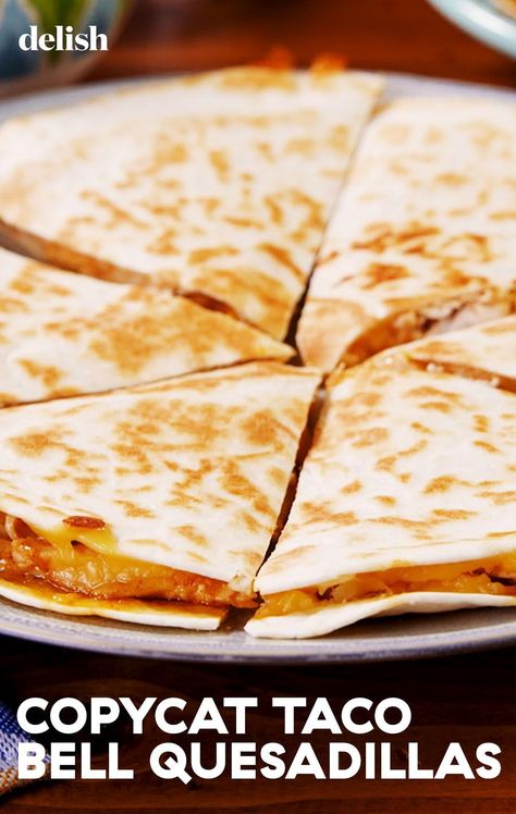 Craving the cheesy, savory goodness of Taco Bell's quesadillas but want to enjoy them from the comfort of your home? Dive into this easy-to-follow recipe that brings the iconic taste right to your kitchen. Perfectly seasoned chicken, melty cheese, and a special sauce come together in a crispy tortilla for a meal that's sure to satisfy your fast-food cravings. Whether it's a quick lunch or a fun dinner idea, these homemade quesadillas are a delicious way to enjoy your favorite flavors without the drive-thru. Lunch Quesadilla, Homemade Quesadillas, Taco Bell Quesadilla Sauce, Quesadilla Sauce, Taco Bell Quesadilla, Supper Meals, Taco Bell Copycat, Copycat Taco Bell, Soup Appetizers