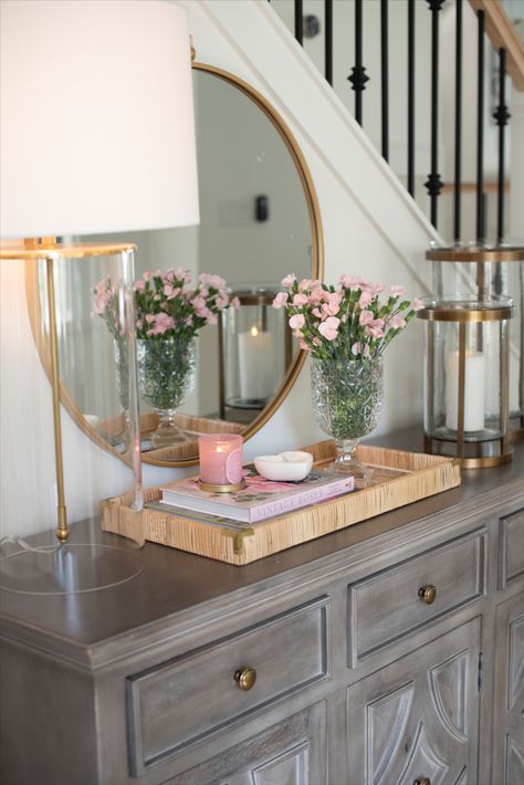 Styling an entry way table with pink touches is such a sophisticated way to adorn your home for Valentine's Day! Walk In Table Decor Living Rooms, Valentines Console Table Decor, Valentines Entry Table Decor, Valentine’s Day Entry Table, Styling Entry Table, Valentines Entry Table, Spring Console Table Decor, Feminine Entryway, Bedroom Console Table Decor