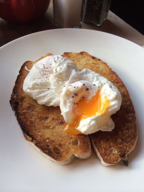 Poached eggs on sourdough toast Poached Egg Aesthetic, Poached Eggs Aesthetic, Eggs On Sourdough Toast, Egg On Sourdough Toast, Egg On Toast Aesthetic, Poached Egg On Avocado Toast, Uni Recipes, Poached Egg On Toast, Poached Eggs On Toast