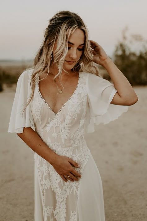 joshua-tree-airbnb-joshua-tree-elopement-joshua-tree-wedding-desert-elopement-california-desert-wedding-joshua-tree-national-park-southern-california-wedding-photographer-terracotta-color-scheme-vintage-glass-cups-maroon-napkins-dreamers-lovers-dress-wedding-hairstyles-wedding-makeup-roaming-travelers-venue-friar-tux-suit Desert Boho Wedding Dress, Desert Wedding Makeup, Casual Western Wedding Dress, Dessert Elopement Dress, Simple Western Wedding Dresses, Boho Farm Wedding Dress, Boho Wedding Dress With Short Sleeves, Western Elopement Wedding Dresses, Desert Elopement Dress