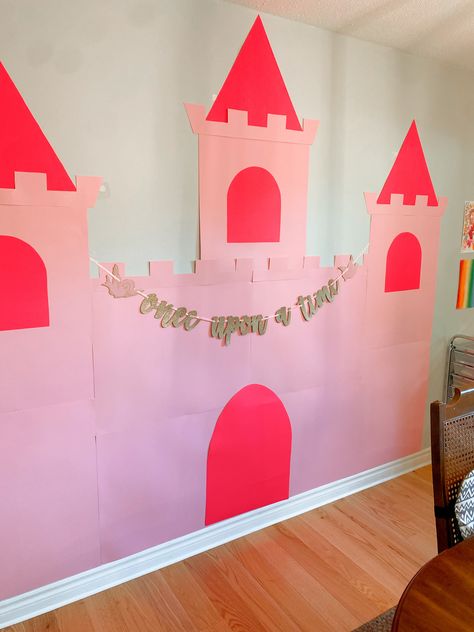 Pink Castle Wall made from poster boards for a toddler Princess Party Princess Birthday Backdrop Ideas, Disney Princess Castle Background, Princess Dress Up Party Ideas, Castle Backdrop Diy, Cardboard Castle Backdrop, Diy Princess Decorations, Diy Castle Cardboard, Diy Castle Backdrop, Princess 5th Birthday Party