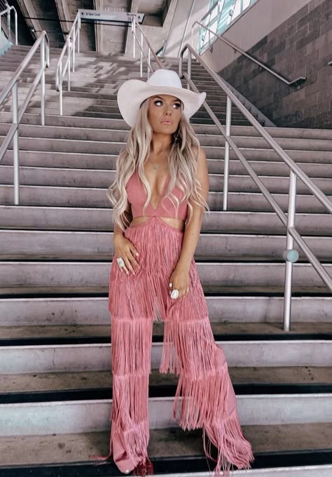 Pink Nfr Outfits, Pink Disco Cowgirl Outfit, 21st Birthday Outfits Cowgirl, Dolly Inspired Outfits, Western Pink Outfits Women, Nashville Pink Outfits, Cowgirl Stage Outfit, Fringe Pants Outfit, Western Vegas Outfits