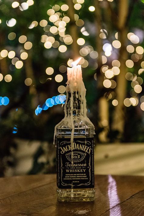 Jack Daniels Centrepieces Jack Daniels Bottle Decor, Whiskey Bottle Candle, Whisky Bottle Centerpiece, Jack Daniels Wedding Decorations, Whiskey Bottle Decor, Whisky Bottle Centerpiece Wedding, Jack Daniels Decorations, Jack Daniels Wedding Centerpieces, Jack Daniels Party Theme Decoration