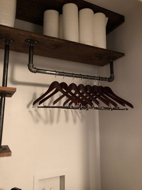 Laundry Room Hanging Bar Between Cabinets, Industrial Utility Room, Hanging Rods In Laundry Room, Industrial Laundry Room Ideas, Industrial Laundry Room, Closet Industrial, Utility Room Organization, Industrial Closet, Cleaning Silver