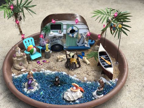 My Beach Fairy Garden that includes dyi 🌴 🌴beach ball, camp🔥 in an original design 😎 Beach Themed Fairy Garden, Camping Diorama, Fairy Garden Camper, Miniature Fairy Garden Diy, Beach Centerpieces, Beach Fairy Garden, Fairy Garden Pots, Indoor Fairy Gardens, Fairy Garden Plants