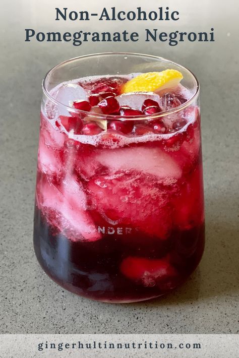 This non-alcoholic pomegranate negroni is beautiful and delicious. A great way to celebrate no alcohol needed! #mocktail #partydrink #festive Mocktail Easy, Pomegranate Mocktail, Mocktails Non Alcoholic, Pomegranate Drinks, Fun Party Drinks, Mocktail Drinks, Pomegranate Recipes, Alcohol Free Drinks, Drink Inspiration