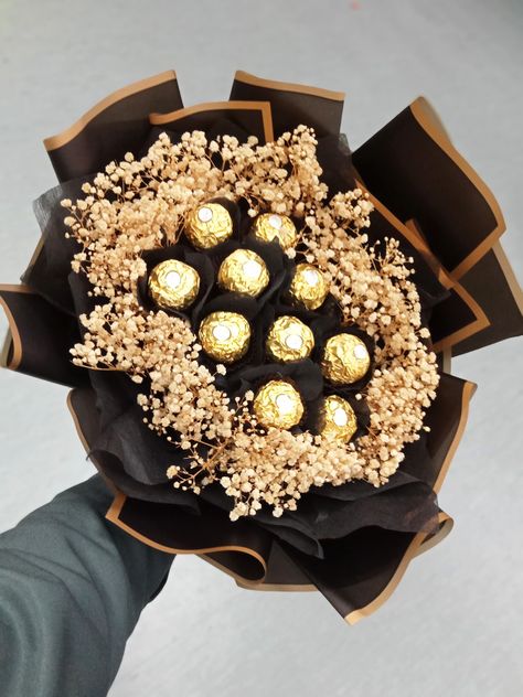 Ferrero chocolate with baby's breath dried flowers Ferrorocher Bouquet, Chocolate Flowers Bouquet Ferrero Rocher, Ferrero Bouquet, Missing Friends, Ferrero Rocher Bouquet, Gifts Bouquet, Chocolate Flowers Bouquet, Gold Bouquet, Art Deco Paintings