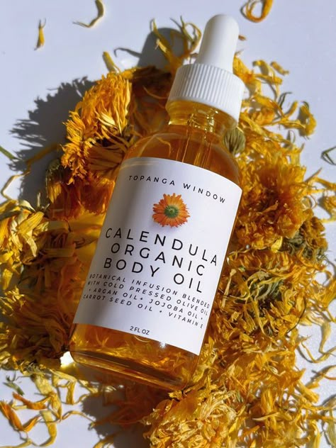 Calendula oil#makeupinspiration #beautytips #skincareroutine #makeuptutorial #cosmeticshaul #naturalbeauty #aestheticmakeup #makeupideas #minimalmakeup #cleanbeauty #glowyskin #everydaymakeup #beautyessentials #cosmeticsreview #makeuptrends #aestheticbeauty #nomakeuplook #selfcareroutine #luxurybeauty #vegancosmetics Organic Skin Care Packaging, Calendula Infused Oil, Calendula Flowers, Infused Oil, Calendula Oil, Skin Care Packaging, Organic Oils, Healing Oils, Carrier Oil