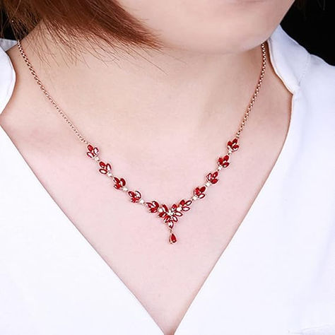 Enhance your beauty with this stunning 18K Gold Necklace, featuring a magnificent 5.63-carat red ruby and sparkling diamonds. This elegant piece is crafted to perfection, offering a timeless allure that complements any attire. Priced at €3,702.99 (including VAT), it's a luxurious addition to your jewelry collection. Ruby And Diamond Necklace, 18k Gold Necklace, Enhance Your Beauty, Gold Necklaces, Chain Gold, Ruby Diamond, Red Ruby, Sparkle Diamonds, Diamond Pendant