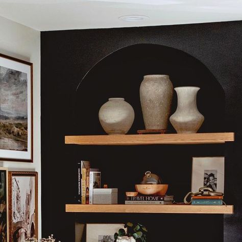 Elisa on Instagram: "We built these arch bookcases, one on each side of the window, with white oak wood shelves with a little wrap around the edge of the opening to give a chunky wood feel to the whole bookcase.  And wood and black together….😍😍👏🏼👏🏼" Oak Wood Shelves, Black Bookshelves, Vegas House, Wood And Black, Oak Shelves, White Oak Wood, Weathered Oak, Wood Shelves, Basement Ideas