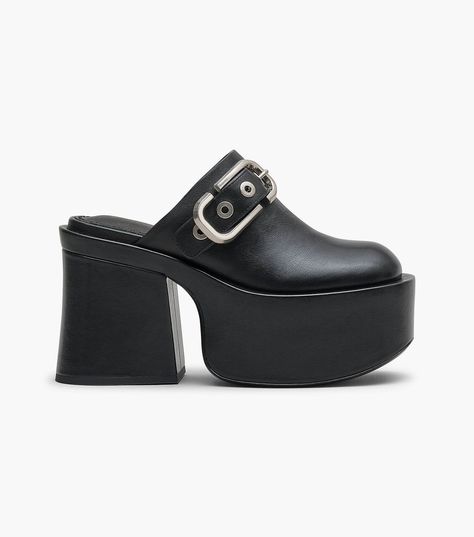 Inherent to the grunge DNA of our brand, these chunky clogs are crafted from luxurious leather and designed for a 4.5" heel with an adjustable J Marc buckle.. Shop Marc Jacobs The J Marc Leather Clog Chunky Clogs, Marc Jacobs Shoes, Leather Clog, Sack Bag, Leather Clogs, Quilted Leather, Boot Sandals, Leather Mini, Knee High Boots