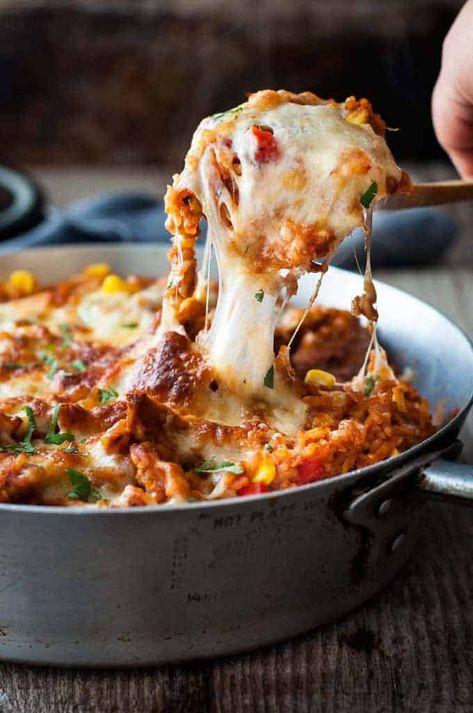 One Pot Chicken Enchilada Rice Casserole | RecipeTin Eats Enchilada Casserole With Rice, One Pot Chicken Enchilada, Enchilada Rice Bake, Chicken Enchilada Rice Casserole, Enchilada Rice Casserole, Chicken Enchilada Rice, Casserole With Rice, Popular Casseroles, Enchilada Rice