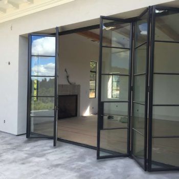 Custom Exterior Steel Bifold Doors | Euroline Steel Windows Folding Patio Doors, Folding Windows, Steel Frame Doors, Steel French Doors, Steel Doors And Windows, Metal Windows, Folding Glass Doors, Steel Windows, House Extension Design